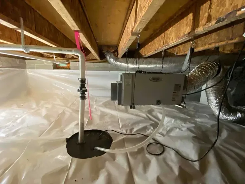 Open ceiling framing and drying ductwork above a protected interior